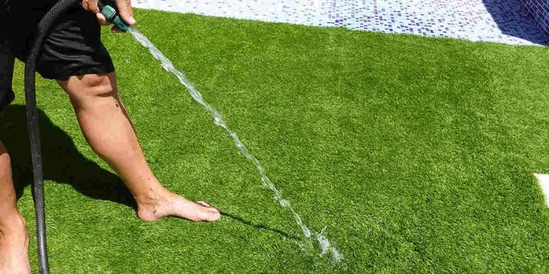 شستشو دوره ای چمن مصنوعی با فشار آب